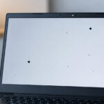 how to fix a black spot on a laptop screen